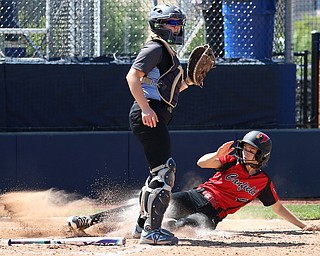 AKRON, OHIO- 05-23-18 SOFTBALL D1 Regional Semi- Canfield Cardinals vs Willoughby South Rebels: Canfield's Mary Gomez (4) scores during the 6th inning at University of Akron, Lee Jackson Softball Field.  MICHAEL G. TAYLOR | THE VINDICATOR