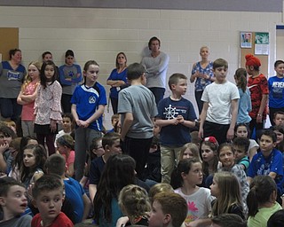 Neighbors | Zack Shively.The Dobbins students logged the amount of minutes they read between Feb. 5 and Feb. 24 for the school's read-a-thon. Pictured, principal Michael Daley recognized the students who read over 1200 minutes during the program.