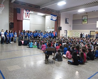 Neighbors | Zack Shively.The Dobbins Elementary assembly for their read-a-thon began with a choir performance so the students got a chance to see what the choir program does. Pictured, the students sang "Somebody to Love" by Queen.