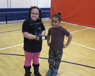 Neighbors | Zack Shively.Google's Expedition AR app is currently only being used in the education sector in schools throughout the nation as Google is still developing and adjusting the app. Now that Austintown Elementary has access to the app, teachers at the school can use it as an educational tool in the classroom. Pictured, Bria and Jayce enjoyed using the app.