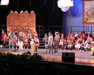 Neighbors | Abby Slanker.A first-grade student, dressed as a badger, took his turn at the microphone during the school’s production of “The Bear Went Over the Mountain - A Musical Journey of Friendship and Adventure."