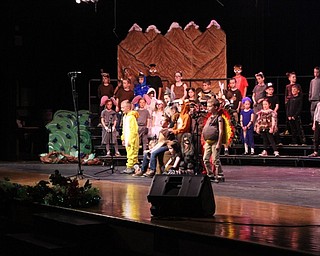 Neighbors | Abby Slanker.Surrounded by his forest creature friends, a first-grade C.H. Campbell Elementary School student portrayed Da Bear, who is in search of adventure, in the school’s production of “The Bear Went Over the Mountain - A Musical Journey of Friendship and Adventure” on April 30.