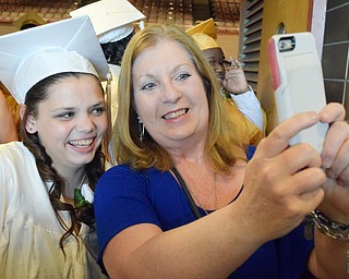 William D. Lewis The Vindicator Harding grad Samantha Neely takes a selfie with Harding teacher Carolyn Daugherty before 5-24-18 commencement.