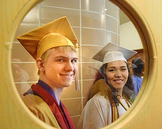 William D. Lewis The Vindicator Harding grads Noah Diehl and Gianna Jones are framed in a window at Packard Music Hall before commencement 5-24-18.