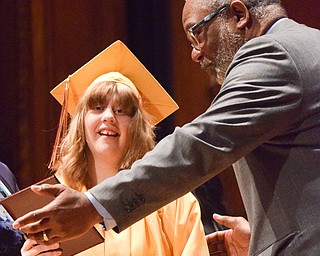 William D. Lewis  Liberty grad Victoria Ann Demarco makes her way across the stage to recieve her diploma from Liberty BOE president Calvin Jones during 5-24-18  commencement.