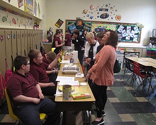 Neighbors | Zack Shively.Each of the St. Charles teachers set up special activities to showcase the skills of the students. For example, one sixth-grade class (pictured) had a science fair.