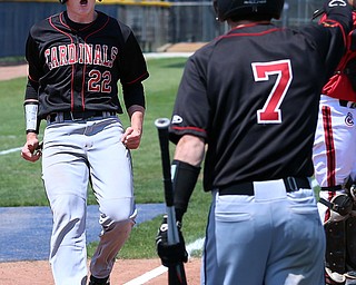 HUDSON, OHIO- 05-24-18 BASEBALL D2 Regional Semi- Chardon Hilltoppers vs Canfield Cardinals: Canfield's Ian McGraw (22) scores during the 2nd inning at The Ball Park at Hudson, Hudson High School.  MICHAEL G. TAYLOR | THE VINDICATOR