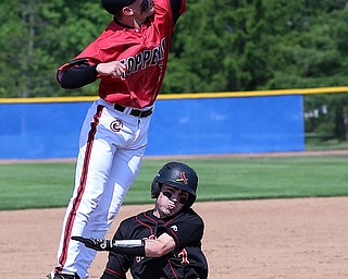 HUDSON, OHIO- 05-24-18 BASEBALL D2 Regional Semi- Chardon Hilltoppers vs Canfield Cardinals: Canfield's Nick Piersante (7)  slides and is safe at 3b as Chardon's Evan Fairbanks (3) tries to catch the throw during the 7th inning at The Ball Park at Hudson, Hudson High School.  MICHAEL G. TAYLOR | THE VINDICATOR