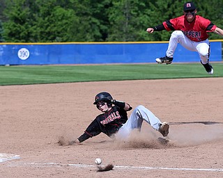 HUDSON, OHIO- 05-24-18 BASEBALL D2 Regional Semi- Chardon Hilltoppers vs Canfield Cardinals: Canfield's Nick Piersante (7)  slides and is safe at 3b as Chardon's Evan Fairbanks (3) tries to catch the throw during the 7th inning at The Ball Park at Hudson, Hudson High School.  MICHAEL G. TAYLOR | THE VINDICATOR