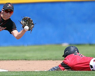 HUDSON, OHIO- 05-24-18 BASEBALL D2 Regional Semi- Chardon Hilltoppers vs Canfield Cardinals: Canfield's Jimmy Fitzgerald (32) applies the tag on a stolen base by Chardon's Luke Callahan (22) during the 1st inning at The Ball Park at Hudson, Hudson High School.  MICHAEL G. TAYLOR | THE VINDICATOR