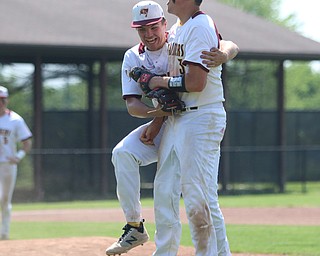 South Range pitcher Jake Gehring (9) celebrates with teammate Mike Cunningham (3) after recording a strikeout for the final out during Thursday afternoons matchup against Waynedale at Massilon High School. Dustin Livesay  |  The Vindicator  5/24/18  Massilon