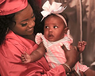 ROBERT K YOSAY  | THE VINDICATOR..Mommy graduated as Destiny Unique Allen and her daughter Jo'Elle 6months....Friends and family cried out with joy Friday night as the 115 graduates in Chaney High SchoolÕs Class of 2018 entered Stambaugh Auditorium...-30-