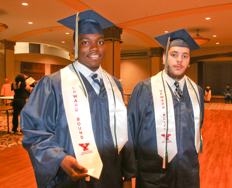 ROBERT K YOSAY  | THE VINDICATOR..Larry Ramson and Silas Elder---Two of the graduates also honored for being part of the UPWARD BOUND PROGRAM at YSU -The goal of Upward Bound is to increase the rate at which participants complete secondary education and enroll in, and graduate from, institutions of postsecondary education.East High School Graduation - class of 2018.. held at Stambaugh Auditorium.....-30-