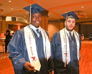 ROBERT K YOSAY  | THE VINDICATOR..Larry Ramson and Silas Elder---Two of the graduates also honored for being part of the UPWARD BOUND PROGRAM at YSU -The goal of Upward Bound is to increase the rate at which participants complete secondary education and enroll in, and graduate from, institutions of postsecondary education.East High School Graduation - class of 2018.. held at Stambaugh Auditorium.....-30-
