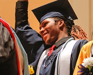 ROBERT K YOSAY  | THE VINDICATOR..after receiving his diploma  Ty'Shawn Rutedge...waves to his parents..East High School Graduation - class of 2018.. held at Stambaugh Auditorium.....-30-