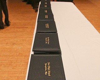 ROBERT K YOSAY  | THE VINDICATOR..Diplomas.... line the table..East High School Graduation - class of 2018.. held at Stambaugh Auditorium.....-30-