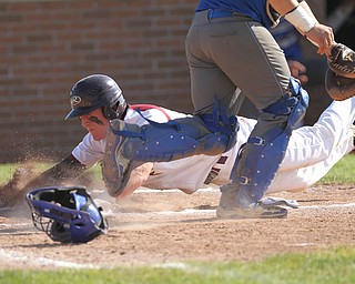 Brycen James (5) of South Range slides safely into home plate during Friday nights Regional Finals matchup against Grand Valley at Massilon High School. Dustin Livesay  |  The Vindicator  5/25/18  Massilon.