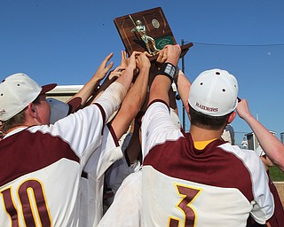 The South Range baseball team raises the Regional Finals Championship trophy after defeating Grand Valley 4-2 on Friday evening at Massilon High School. Dustin Livesay  |  The Vindicator  5/25/18  Massilon.
