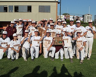 The South Range baseball team pose for a picture with the Regional Finals Championship trophy after defeating Grand Valley 4-2 on Friday evening at Massilon High School. Dustin Livesay  |  The Vindicator  5/25/18  Massilon.