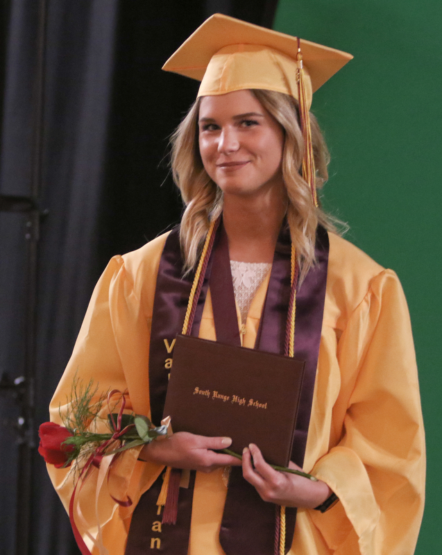 ROBERT K YOSAY  | THE VINDICATOR..South Range Class of 2018Õs , High School Principal Stephen P. Rohan described its 120 graduates a Òone of a kind class.Ó..Angel Fickes.. poses with her diploma before the start of the ceremonies...-30-