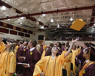 ROBERT K YOSAY  | THE VINDICATOR..South Range Class of 2018Õs , High School Principal Stephen P. Rohan described its 120 graduates a Òone of a kind class.Ó..The usual flip of the hats - ..-30-