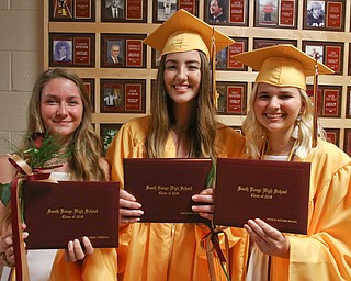 ROBERT K YOSAY  | THE VINDICATOR..South Range Class of 2018Õs , High School Principal Stephen P. Rohan described its 120 graduates a Òone of a kind class.Ó..bff  all with diplomas -  Nicole Winkel--Ana Luiza Justino -and Anna Marie Turnbull.show off their diplomas.-30-