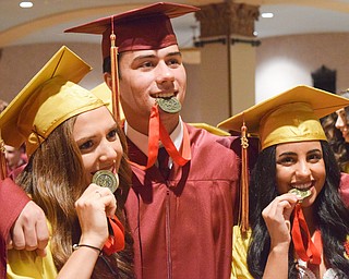 William D. Lewis The Vindicator Mooney grads from left, Julia Giamboi, Ryan Stefanec and Laura Emch clown around with their 4 year acedemic achievement medals before 5-27-18 commencement at Stambaugh.
