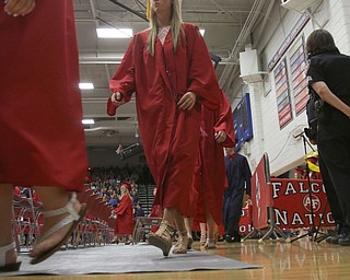             ROBERT  K. YOSAY | THE VINDICATOR..Graduates head to the gym for the ceremony..Austintown Fitch 2018  Sunday afternoon at the Gymnasium