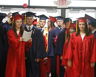             ROBERT  K. YOSAY | THE VINDICATOR..Graduates head to the gym for the ceremony..Austintown Fitch 2018  Sunday afternoon at the Gymnasium