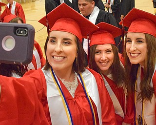 William D. Lewis The Vindicator  Girard grads L-R Gabby Yanniello, Jade Tibbs and Bella Yanniello(twin sisters) take a selfie before 5-27-18 commence at GHS.