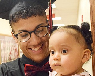 William D. Lewis The Vindicator  Girard grad Devin Wilson shares a moment with his niece Amelia Levels, 1,  before 5-27-18 commencement at GHS.
