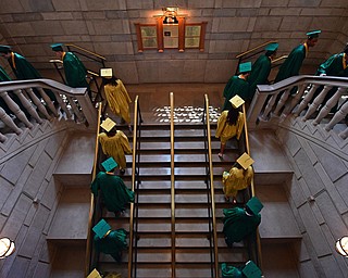 YOUNGSTOWN, OHIO - MAY 27, 2018: Ursuline seniors make their way up the stairs and into the auditorium during the Ursuline High School graduation ceremony, Sunday afternoon at Stambaugh Auditorium. DAVID DERMER | THE VINDICATOR