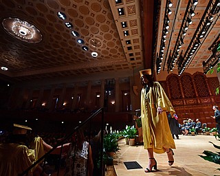YOUNGSTOWN, OHIO - MAY 27, 2018: Erin McLaughlin walks across the stage after receiving her diploma during the Ursuline High School graduation ceremony, Sunday afternoon at Stambaugh Auditorium. DAVID DERMER | THE VINDICATOR