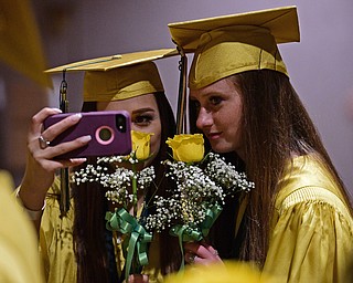 YOUNGSTOWN, OHIO - MAY 27, 2018: Adriana Quattro, left, and Abigaile Price take a selfie on a cellphone before the Ursuline High School graduation ceremony, Sunday afternoon at Stambaugh Auditorium. DAVID DERMER | THE VINDICATOR