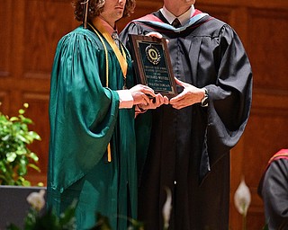 YOUNGSTOWN, OHIO - MAY 27, 2018: Richard Weitzel gets his Valedictorian plaque from Principal Matthew Sammartino during the Ursuline High School graduation ceremony, Sunday afternoon at Stambaugh Auditorium. DAVID DERMER | THE VINDICATOR