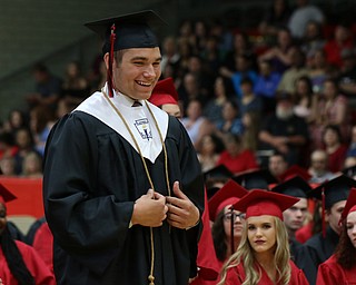 Anthony Iarussi gets heckled by his classmates as he walks to give his speech during the Struthers High School Commencement on Sunday afternoon.   Dustin Livesay  |  The Vindicator  5/27/18  Struthers.