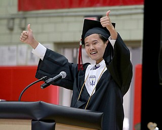 Struthers High School graduate Ethan Vo gives his classmates thumbs up during his Valedictorian speech during the Struthers High School Commencement on Sunday afternoon.   Dustin Livesay  |  The Vindicator  5/27/18  Struthers.