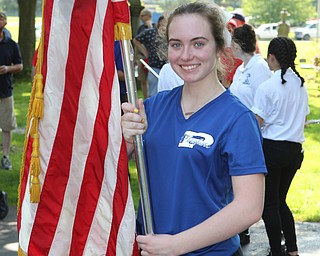 Olivia Barrett of the Poland Seminary flagline carries a flag during the Memorial Day Parade in Poland on Monday morning. Dustin Livesay  |  The Vindicator  5/28/18 Poland