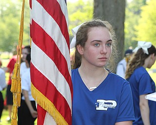 Olivia Barrett of the Poland Seminary flagline carries a flag during the Memorial Day Parade in Poland on Monday morning. Dustin Livesay  |  The Vindicator  5/28/18 Poland