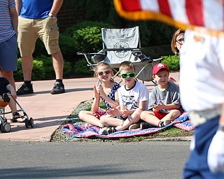 L-R) Finn Rousher (1), Madilynn Mikolich (7), Michael Mickley (6), and Galas Mikolich (6) all of Poland clap their hands as the veterans carry a flag at the begining of the Memorial Day Parade in Poland on Monday morning. Dustin Livesay  |  The Vindicator  5/28/18 Poland