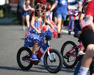 Brooklynn Simon (5) of Poland decorated her bike and rode in the Memorial Day Parade at Poland on Monday morning. Dustin Livesay  |  The Vindicator  5/28/18 Poland