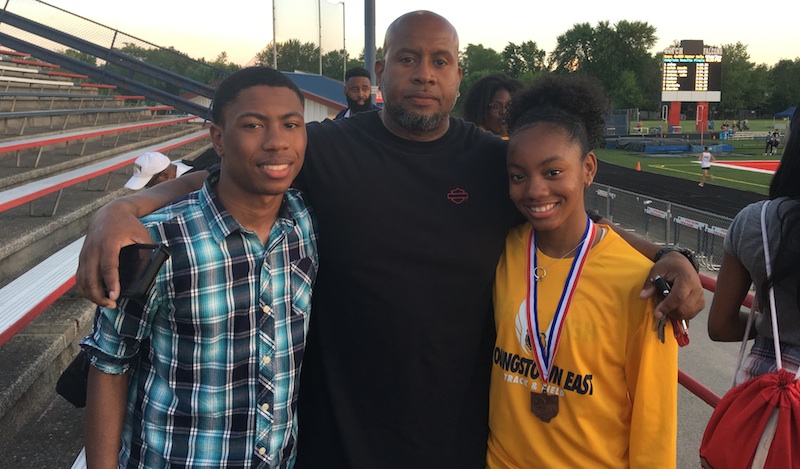 East’s Laniya Lewis, right, with her father, Lawalyn Lewis, and twin brother, Lawalyn Jr., is heading to state as part of the Golden Bears’ 4x200 relay. She wears a diamond ring around her neck to remember her late mother, Claretta Jackson.