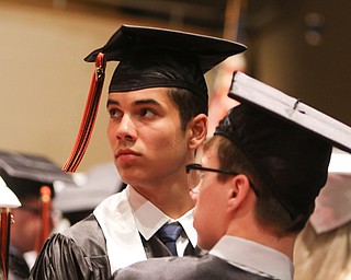 ROBERT K YOSAY  | THE VINDICATOR..Howland Graduation...  at Packard Music Hall in Warren Class of 2018..Christian Stiffy   tuns and looks for friends and relatives as the ceremony begins...-30-