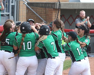 ROBERT K YOSAY  | THE VINDICATOR..West Branch Warriors - defeated Jonathan Alder Pioneers  - 5-4 where the lead changed hands several times ..WB  engulf Kylei Coffelt as she tags home..-30-