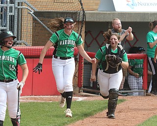 ROBERT K YOSAY  | THE VINDICATOR..West Branch Warriors - defeated Jonathan Alder Pioneers  - 5-4 where the lead changed hands several times ..#10 Kelsey Byers -#16 Jordan Anderson  Catcher Sam Morris-  #22 Delaney Rito run from the dugout to congratulate #17 Kylie Coffelt ..-30-