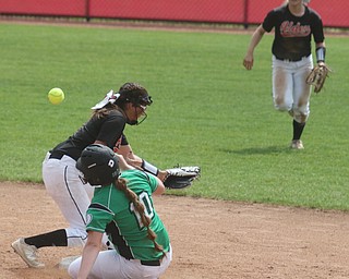 ROBERT K YOSAY  | THE VINDICATOR..West Branch Warriors - defeated Jonathan Alder Pioneers  - 5-4 where the lead changed hands several times ..Safe at second... as #10 Kelsey Byers slides in as the ball takes a bad bounce on Alders.. Angela Brandel (2nd base).-30-