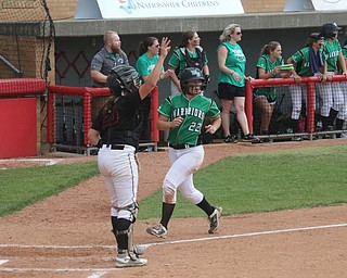 ROBERT K YOSAY  | THE VINDICATOR..West Branch Warriors - defeated Jonathan Alder Pioneers  - 5-4 where the lead changed hands several times ..#22 Delaney Rito.. looks over her shoulder as she scores the go ahead run for the second time.-30-