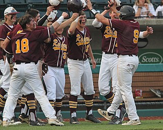 Jake Gehring (9) of South Range gets greeted by his teammates after hitting a 3-run double in the sixth inning during Thursday evenings State Semifinals matchup at Huntington Park in Columbus. Dustin Livesay  |  The Vindicator  5/31/18  Columbus