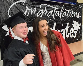 William D. Lewis The Vindicator  Canfield grad Thomas Beck shares a moment with fellow  grad Christina Rivera before 6-1-18 commencement at CHS.