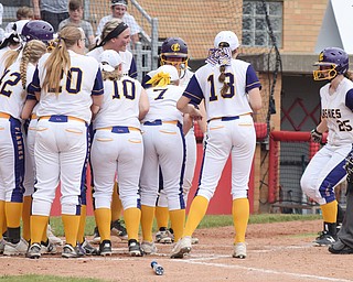 William D. Lewis Th Vindicator   Champion's Abby White(25) heads home to congrats after hitting home run during 7th inning 6-1-18 win over North Union at Akron to advance to state championship game.